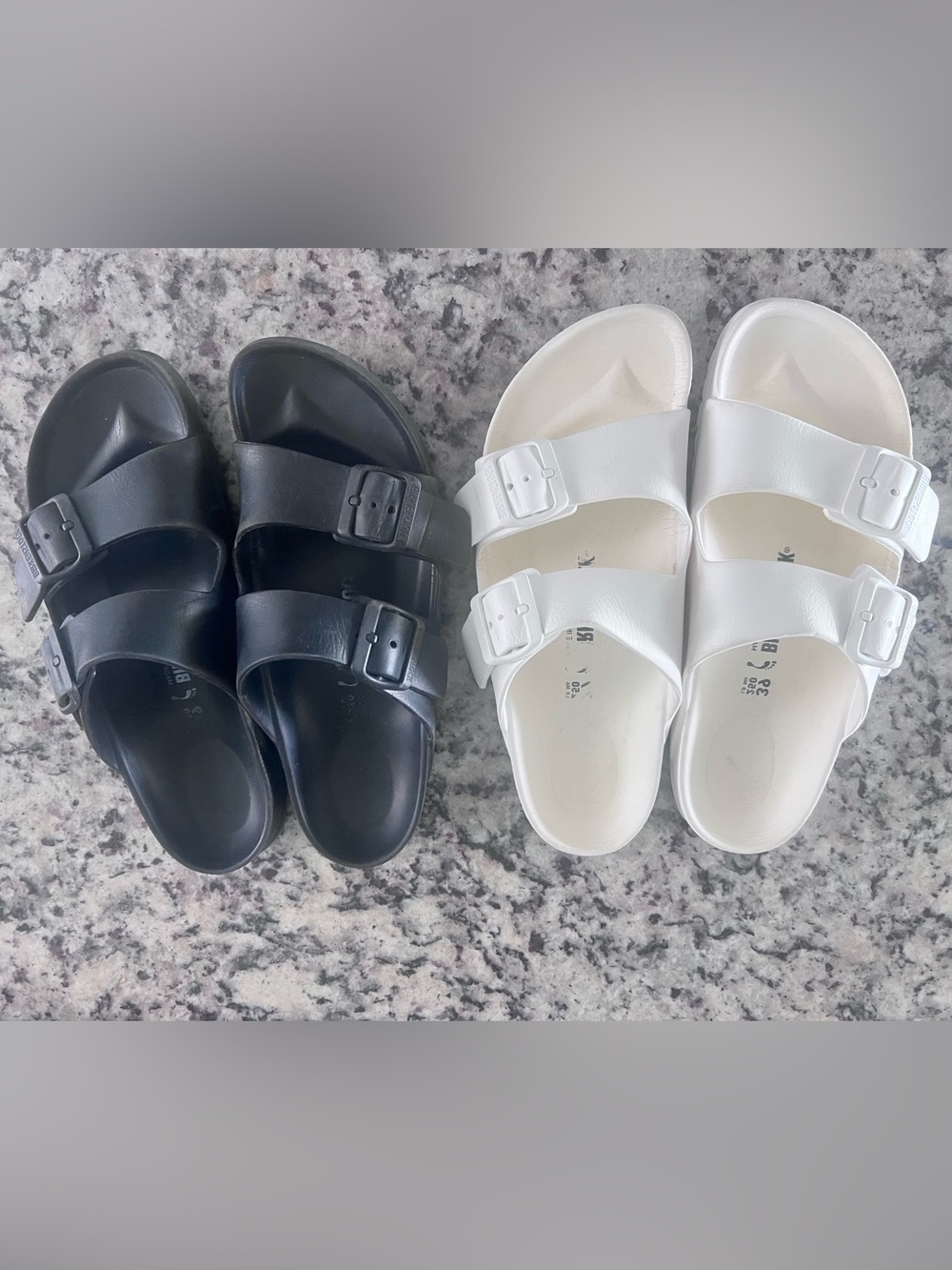 2 pair Birkenstock Black and also white Sandals